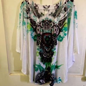 Poncho style top, distressed look.